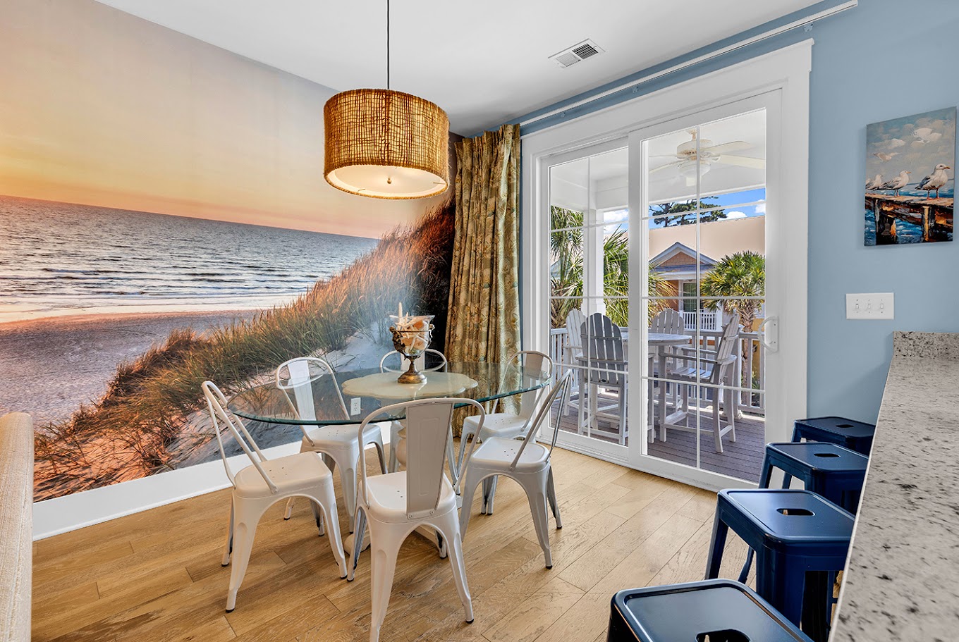 Dining area with mural and balcony